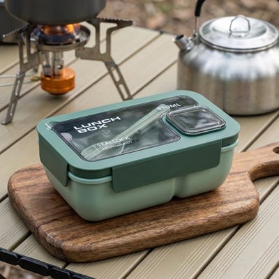 Lunch box boite bleu et nous voyons les accesoires